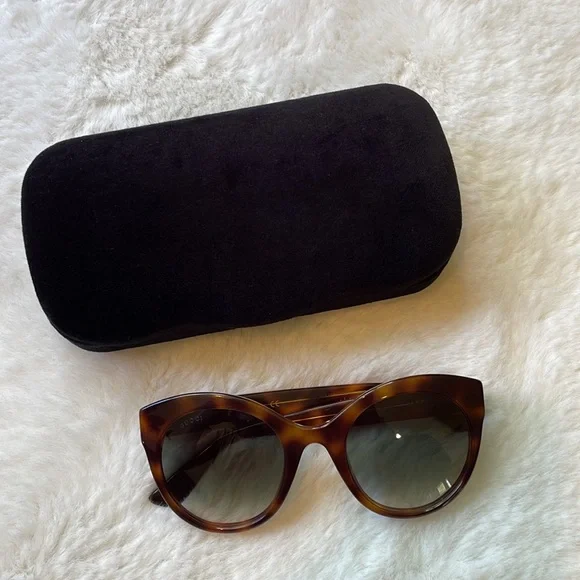 Gucci GG0028 Sunglasses feature an oversized cat-eye shape for women in brown. - Picture 5 of 11